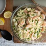 roasted shrimp and orzo salad on a wooden board