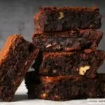 How to Make Gooey & Fudgy Ina Garten Brownies (Recipe With Tips & Video) Ina Garten Outrageous Brownies stacked up
